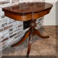 F48. Antique mahogany game table. 29”h x 36”w x 18”d 